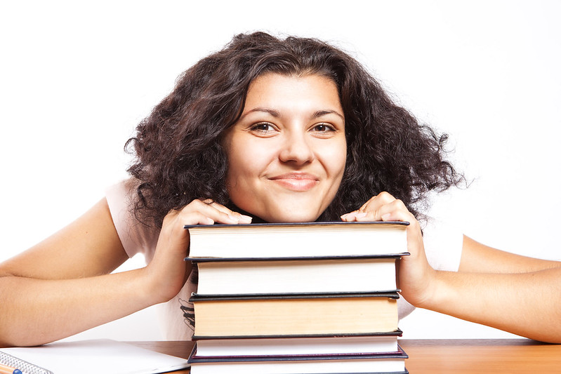Learn Allover Happy student with books
